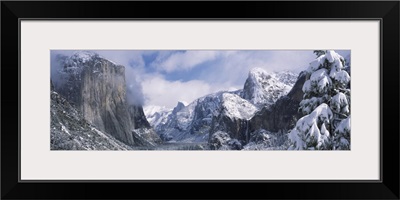 Mountains and waterfall in snow, Tunnel View, El Capitan, Half Dome, Bridal Veil, Yosemite National Park, California,