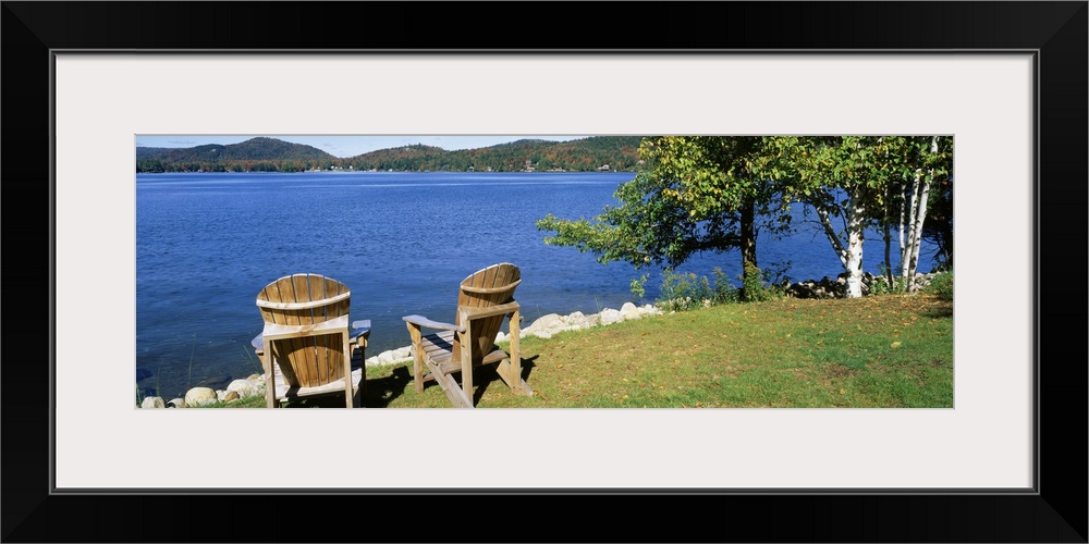 New York, Adirondack State Park, Adirondack Mountains, Fourth Lake, Adirondack Chairs on a lawn