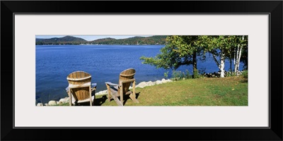 New York, Adirondack State Park, Adirondack Mountains, Fourth Lake, Adirondack Chairs on a lawn