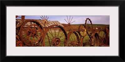 Old barn with a fence made of wheels, Palouse, Whitman County, Washington State,