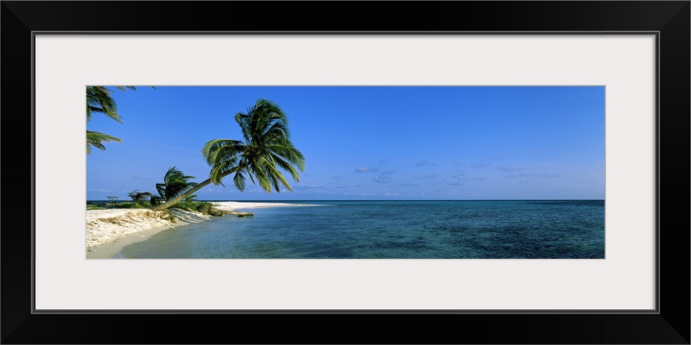 Tropical scene of the ocean at Laughing Bird Caye in Belize.