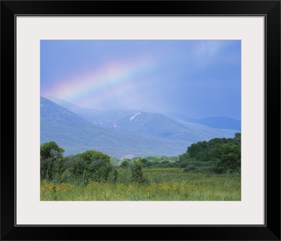 Rainbow over a mountain range, Taos, Taos County, New Mexico