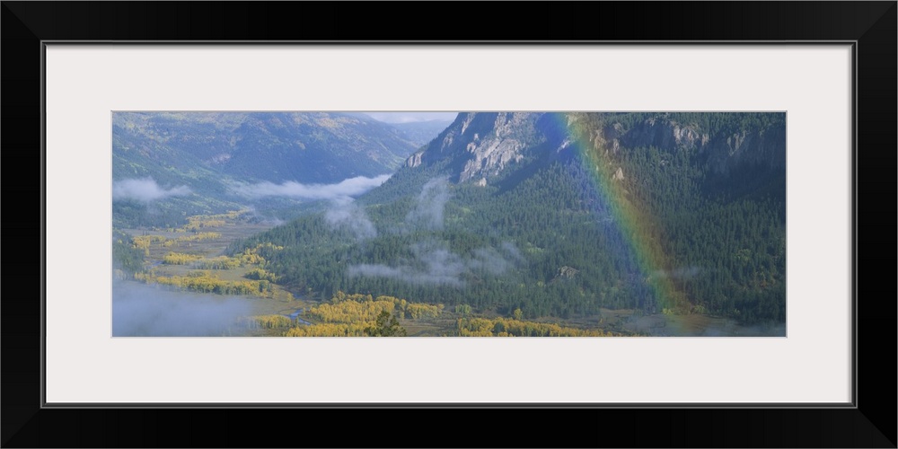 Rainbow over a valley, Conejos County, Colorado