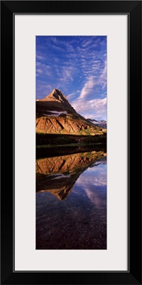 Reflection of a mountain in a lake, Alpine Lake, US Glacier National Park, Montana,