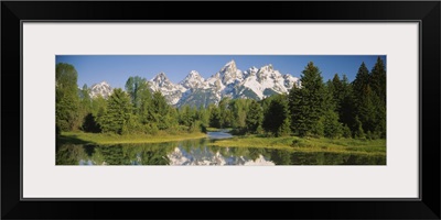 Reflection of a snowcapped mountain in water, Near Schwabachers Landing, Grand Teton National Park, Wyoming