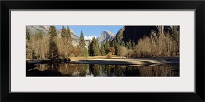 Reflection of mountains and trees in a lake, Half dome, Yosemite National Park, California