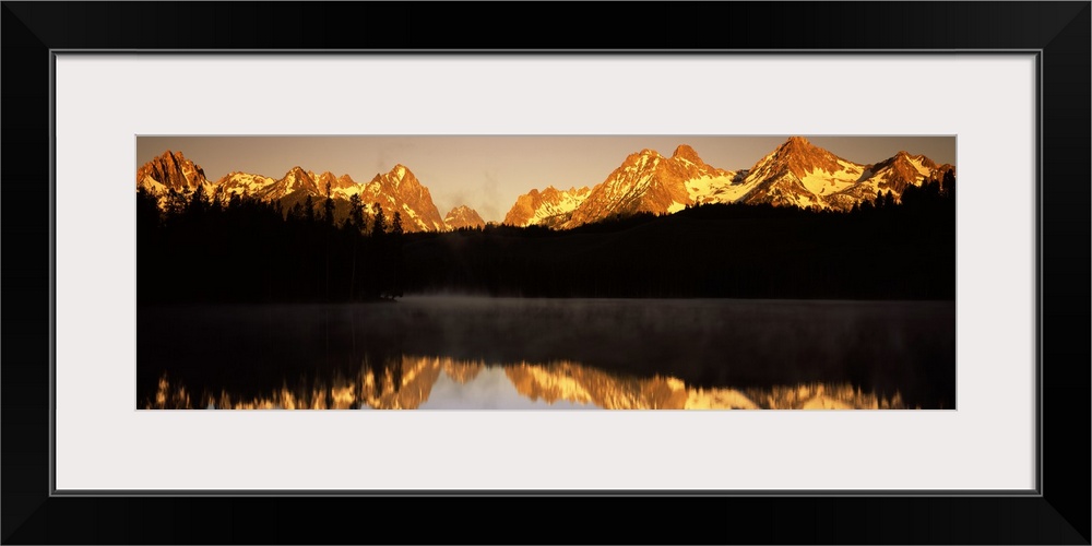 Reflection of mountains and trees in water Little Redfish Lake Sawtooth National Recreation Area Custer County Idaho