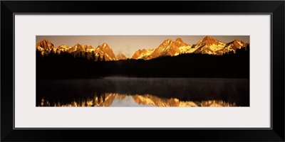 Reflection of mountains and trees in water Little Redfish Lake Sawtooth National Recreation Area Custer County Idaho