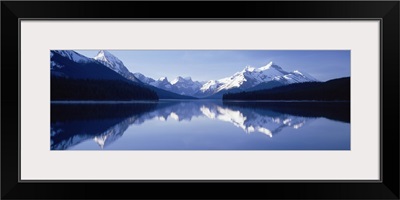 Reflection of mountains in a lake, Maligne Lake, Jasper National Park, Alberta, Canada