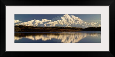 Reflection of snow covered Mt McKinley in water, Denali National Park, Alaska