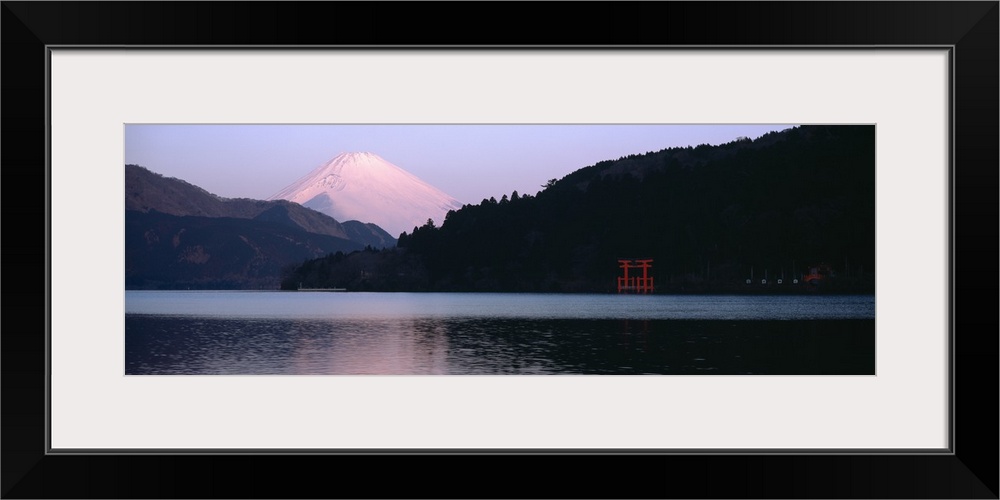 Reflection of snowcapped mountains in a lake, Lake Ashinoko, Mt Fuji, Hakone, Kanagawa Prefecture, Japan