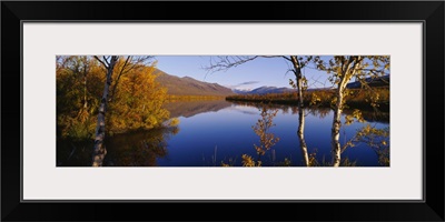 Reflection of trees and mountains in a river, Vistas River, Nikkaluokta, Lapland, Sweden