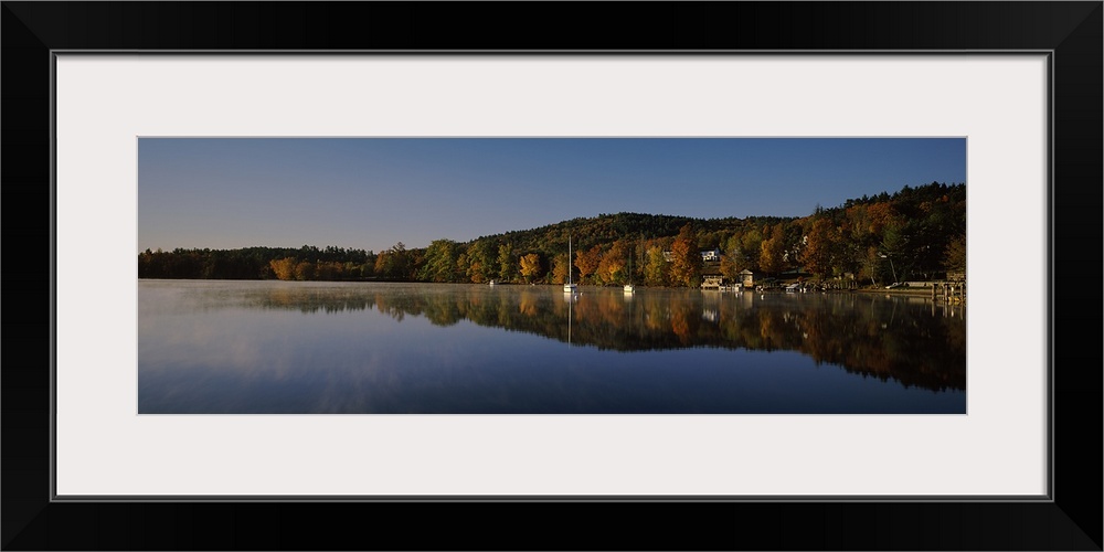 Reflection of trees in a lake, Lake Winnipesaukee, Center Harbor, Belknap County, New Hampshire, USA