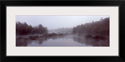 Reflection of trees in water, Moose River, New York State