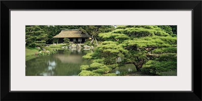 Reflection of trees in water, Tea House, Imperial Gardens, Kyoto Prefecture, Honshu, Japan