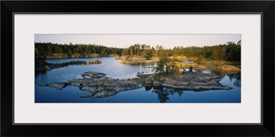 Reflection of trees on water, Archipelago, Baltic Sea, Sodermanland, Sweden