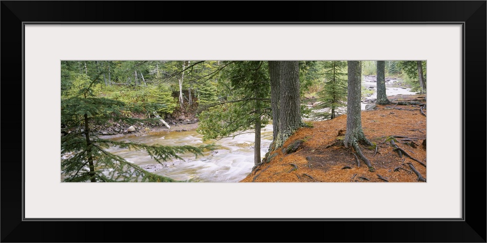 Gooseberry River running through the woods of the Gooseberry Falls State Park in Minnesota.