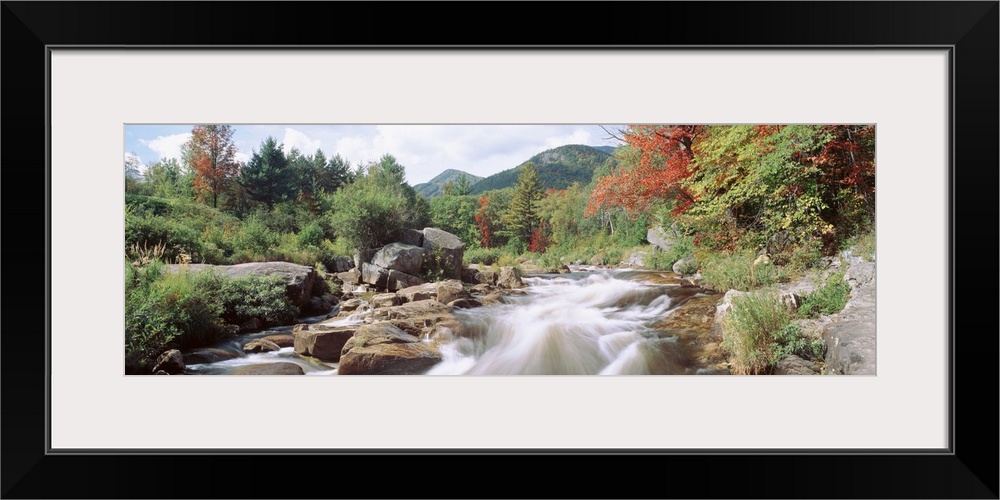 Flowing rapids on the Ausable River on an early fall day in Wilmington, New York.