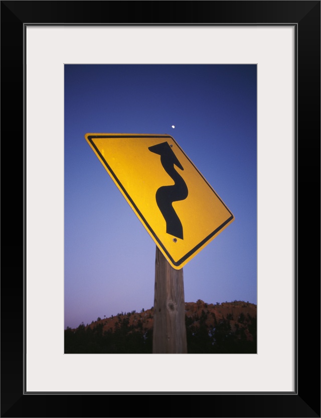 Road Sign With Arrow Pointing To Moon