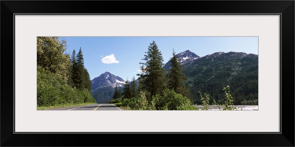 Road with a mountain in the background, Exit Glacier Road, Seward, Kenai Peninsula Borough, Alaska, USA