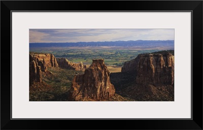 Rock formations on a landscape, Grand Junction, Grand Valley, Colorado National Monument, Colorado