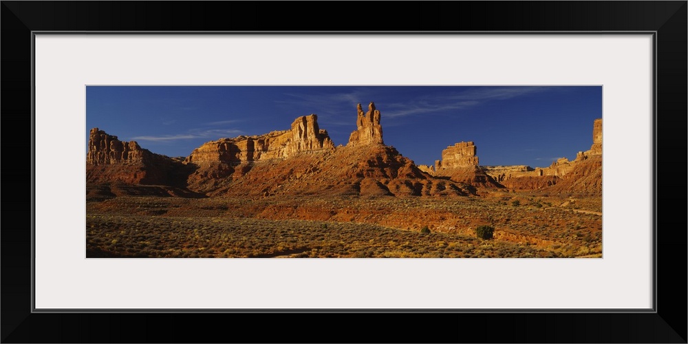 Rock formations on a landscape, Monument Valley Tribal Park, Monument Valley, Arizona