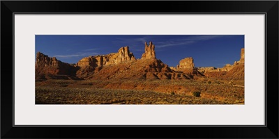 Rock formations on a landscape, Monument Valley Tribal Park, Monument Valley, Arizona