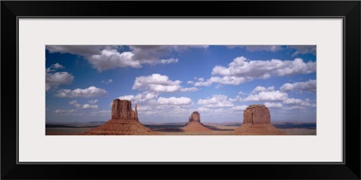 Rock formations on a landscape, The Mittens, Monument Valley, Arizona