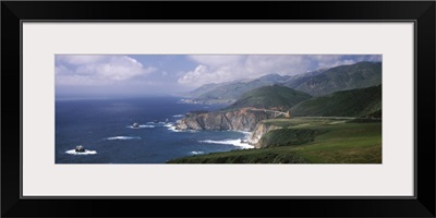 Rock formations on the beach, Bixby Bridge, Pacific Coast Highway, Big Sur, California,