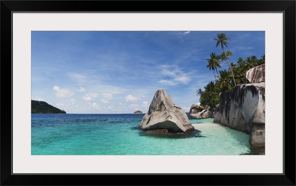Landscape photograph on a large canvas of clear blue waters in Malaysia, along the rocky shoreline of Pulau Dayang Beach, ...