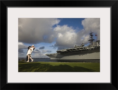 Sculpture Unconditional Surrender with USS Midway aircraft carrier