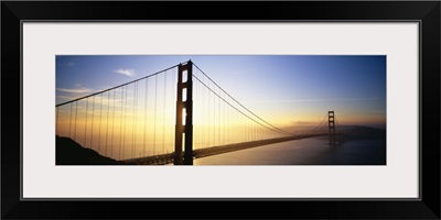 Silhouette of a bridge at dawn, Golden Gate Bridge, San Francisco, California