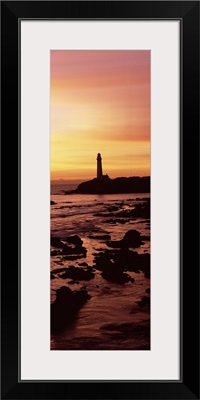 Silhouette of a lighthouse at sunset, Pigeon Point Lighthouse, San Mateo County, California,