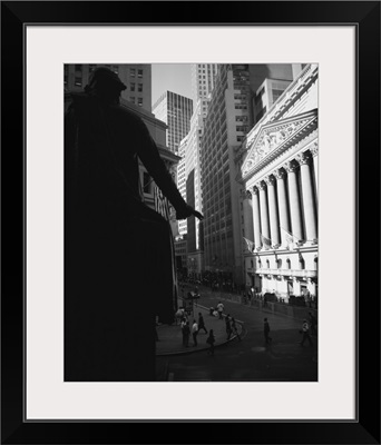 Silhouette of George Washington statue in front of a financial building, New York Stock Exchange, Wall Street, Times Square, Manhattan, New York City, New York State