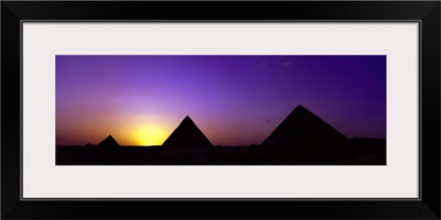 Silhouette of pyramids at dusk, Giza, Egypt