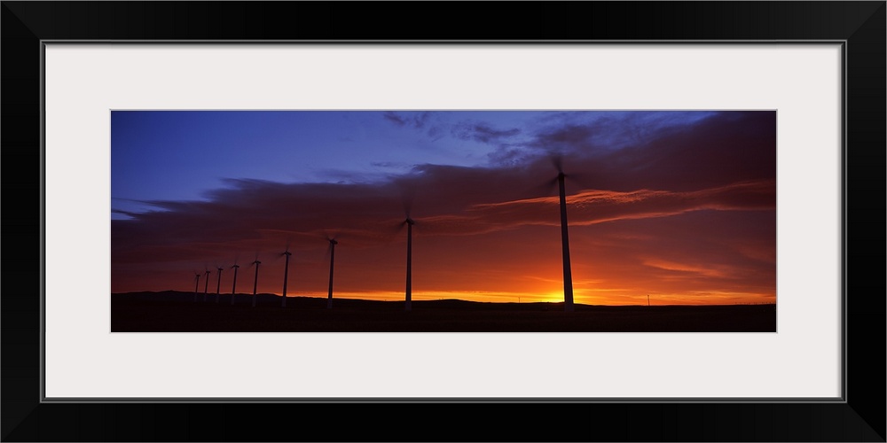 Silhouette of windmills in a field, Cowley Wind Farm, Cowley, Alberta, Canada