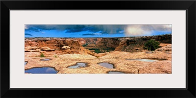 Slickrock waterpocket pools, Canyon De Chelly National Monument, Arizona