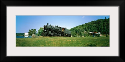 Steam train in a field near Lake Kashagawigamog, Haliburton, Ontario, Canada