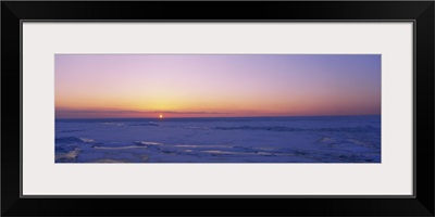 Sunset over a frozen lake, Lake Erie, New York State