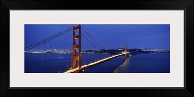 Suspension bridge lit up at dusk, Golden Gate Bridge, San Francisco, California,