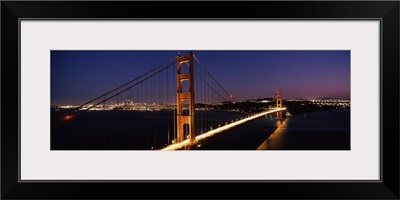 Suspension bridge lit up at dusk, Golden Gate Bridge, San Francisco, California,