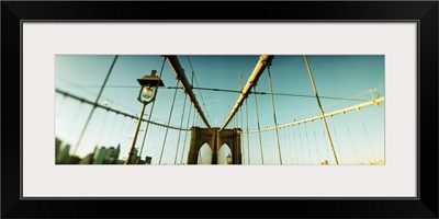 Suspension bridge with a city in the background Brooklyn Bridge Manhattan New York City New York State