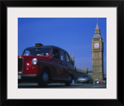 Taxi on the road with clock tower in the background, Big Ben, London, England