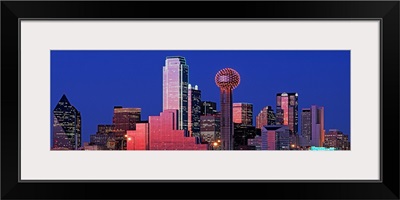 Texas, Dallas, Panoramic view of an urban skyline at night