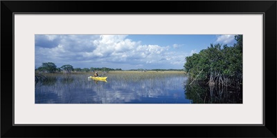 Tourist kayaking in a pond, Nine Mile Pond Canoe Trail, Everglades National Park, Florida,