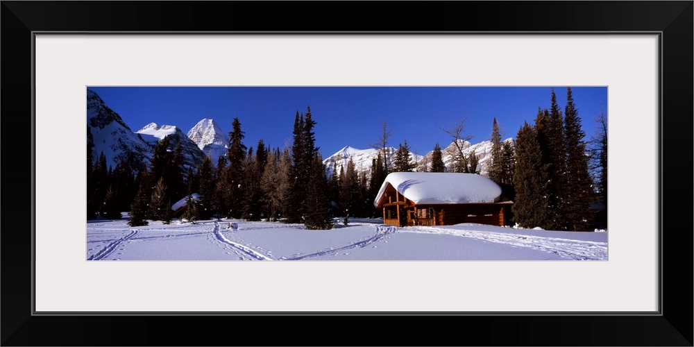 Tourist lodge in a snow covered field, Naiset Cabins and Huts, Mt Assiniboine Provincial Park, British Columbia, Canada