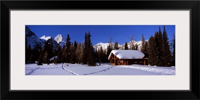 Tourist lodge in a snow covered field, Naiset Cabins and Huts, Mt Assiniboine Provincial Park, British Columbia, Canada