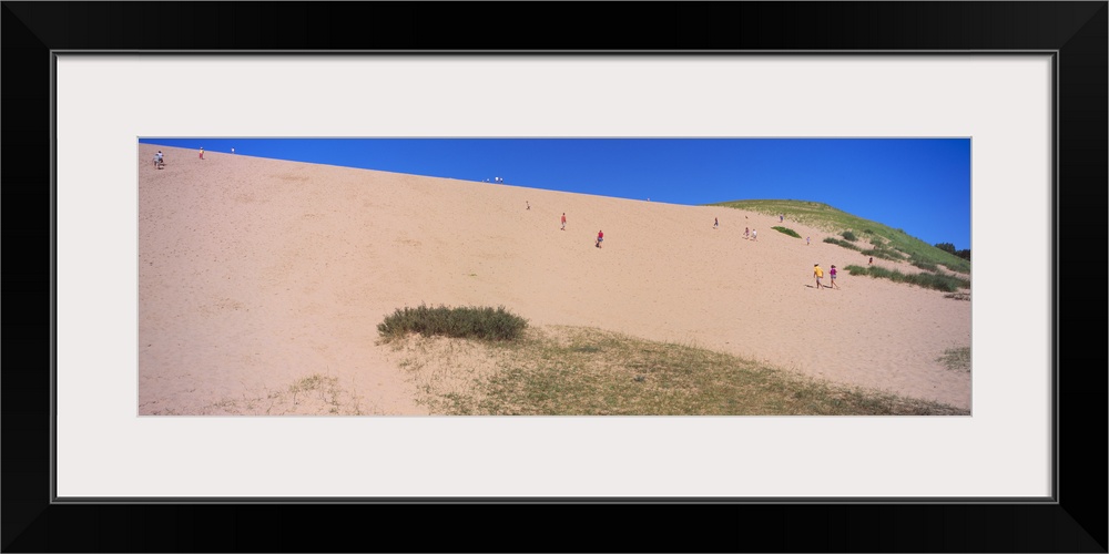 Tourists climbing a sand dune, Sleeping Bear Dunes National Lakeshore, Lake Michigan, Michigan