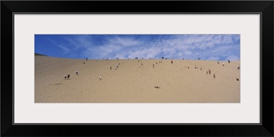 Tourists climbing a sand dune, Sleeping Bear Dunes National Lakeshore, Michigan