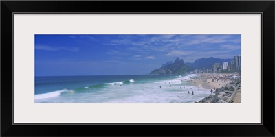 Tourists on the beach, Ipanema Beach, Rio de Janeiro, Brazil